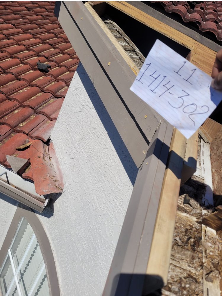 Slide of John Feeney Roofing