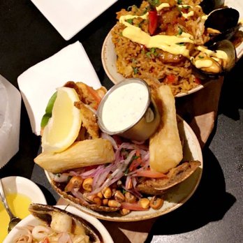 Los Andes Restaurant - I had the  903 tasting and my cousin had the Paella. Portions are huge! - Latin American Near Me - Providence, Rhode Island