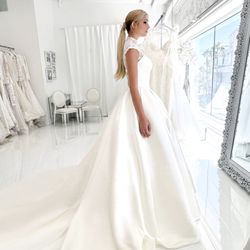 Winnie Couture - Giulietta (3562). A timeless strapless ballgown with a flattering basque (V) waist and a full, romantic skirt.