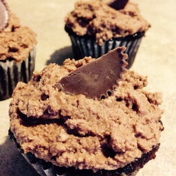 Hello Cupcake - Dark chocolate cake with chocolate peanut butter frosting and a Reese's peanut butter cup on top - Desserts Near Me Hello Cupcake - Dark chocolate cake with chocolate peanut butter frosting and a Reese's peanut butter cup on top - Desserts Near Me