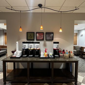 Hampton Inn & Suites Plattsburgh - treat area in-front of the check in/out counter which provides to go breakfast bags after 11AM and in the evening delicious large cookies. - Hotels Near Me - Plattsburgh, New York