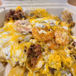 Chicken & bacon fries & I grabbed a few of my daughters shrimp. It was good but I think I'll stick to the steak it seems to be more fresh. Chicken & bacon fries & I grabbed a few of my daughters shrimp. It was good but I think I'll stick to the steak it seems to be more fresh.
