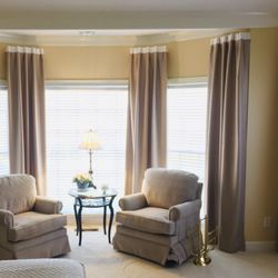 Covering Windows - Innovative corner panels suspended no visible hardware