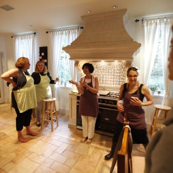 Cook With Muriel - a group of women in a kitchen - Cooking Classes Near Me - Tampa, Florida Cook With Muriel - a group of women in a kitchen - Cooking Classes Near Me - Tampa, Florida