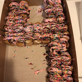 Donut Country - You get to choose from I believe 8 icing flavors, sprinkles or no sprinkles. Makes a great birthday cake for your donut lover! - Donuts Near Me - Murfreesboro, Tennessee