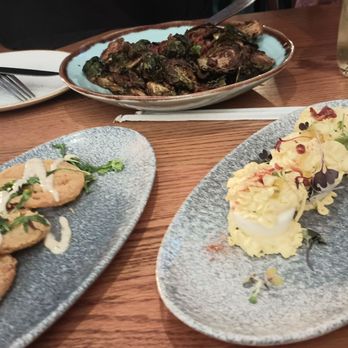 Hen Quarter - Fried green tomatoes, Deviled Eggs with bacon bits along with a dish of grilled Brussel Sprouts. - Southern Near Me - Alexandria, Virginia