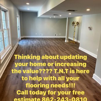 Tnt Flooring - an empty room with wood floors - Flooring Near Me Tnt Flooring - an empty room with wood floors - Flooring Near Me