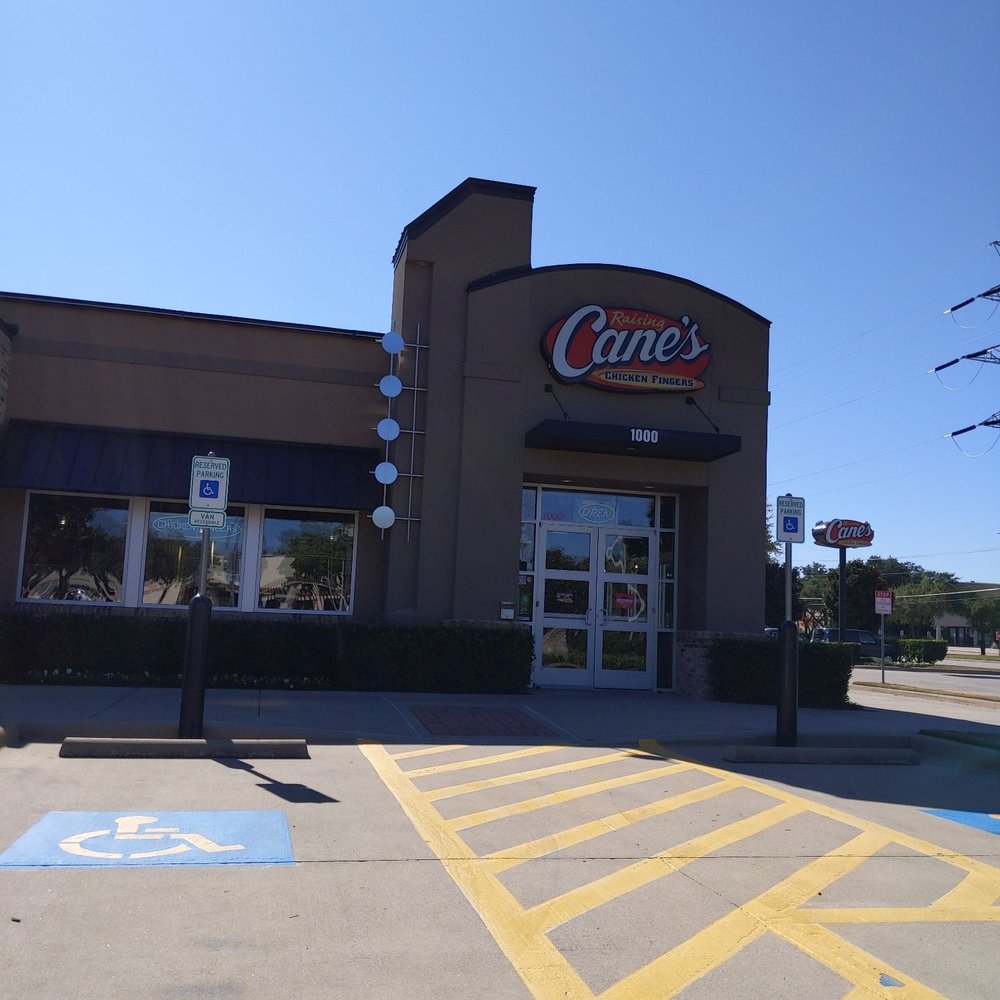 Raising Cane's Chicken Fingers - the outside of the building - Fast Food Near Me - Plano, Texas Raising Cane's Chicken Fingers - the outside of the building - Fast Food Near Me - Plano, Texas
