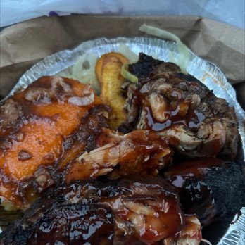 Ochi Jerk Place - a plate of ribs, ribs, and potatoes - Caribbean Near Me - Jamaica, New York Ochi Jerk Place - a plate of ribs, ribs, and potatoes - Caribbean Near Me - Jamaica, New York