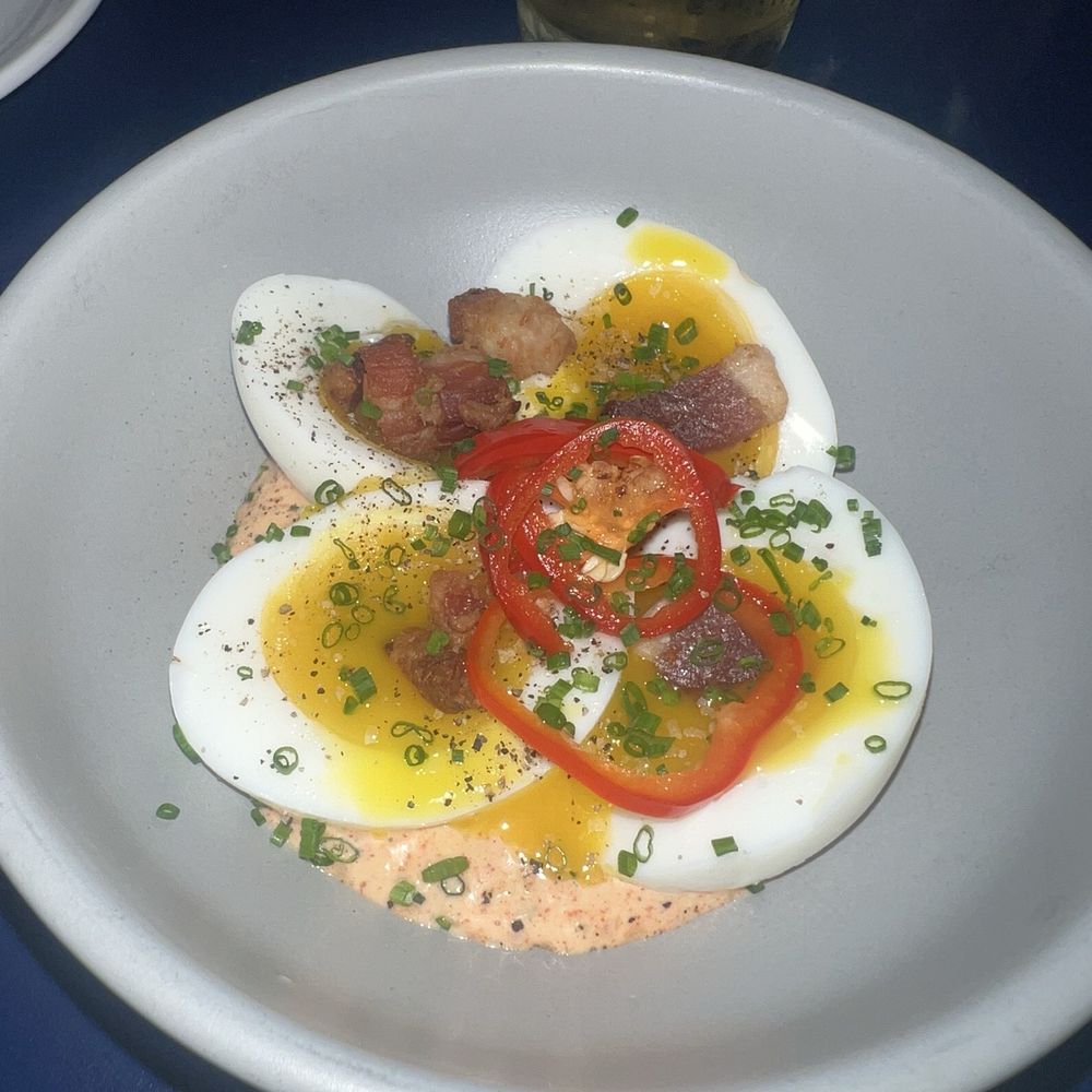Wilder - Devilish Eggs 7-min eggs, lardons, pickled red fresnos, spicy aioli, chives - American Near Me - Portland, Oregon