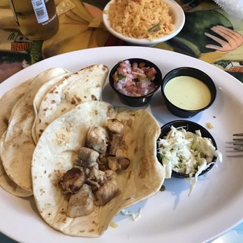 La Tolteca - Buffalo - Fish tacos with chopped fish and a small serving of cole slaw and pick de gallo on the side - Mexican Near Me - Williamsville, New York