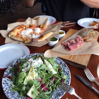 Frontager's Pizza - Arugula salad and cheese pizza with burrata added at our request. - Pizza Near Me - Pacific Beach, Washington Frontager's Pizza - Arugula salad and cheese pizza with burrata added at our request. - Pizza Near Me - Pacific Beach, Washington