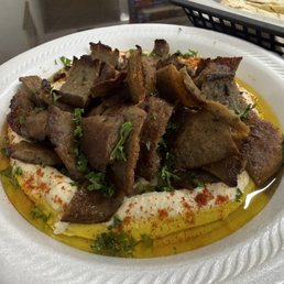 Hummus with meat appetizer
