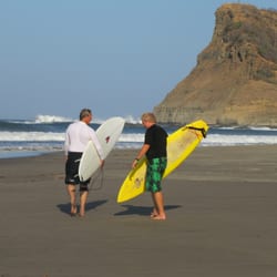 Tom Grubbs heading out for a surf at Ponga Drops in Nica.