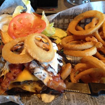 Sunset Grill - Black and Blue Burger with Onion Rings - American Near Me - Three Lakes, Wisconsin Sunset Grill - Black and Blue Burger with Onion Rings - American Near Me - Three Lakes, Wisconsin
