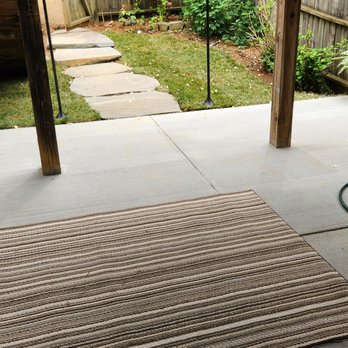 Teo's Landscaping - After Teo's Landscaping crew poured the new concrete patio, and placed a beautiful new stone walkway - Landscaping Near Me