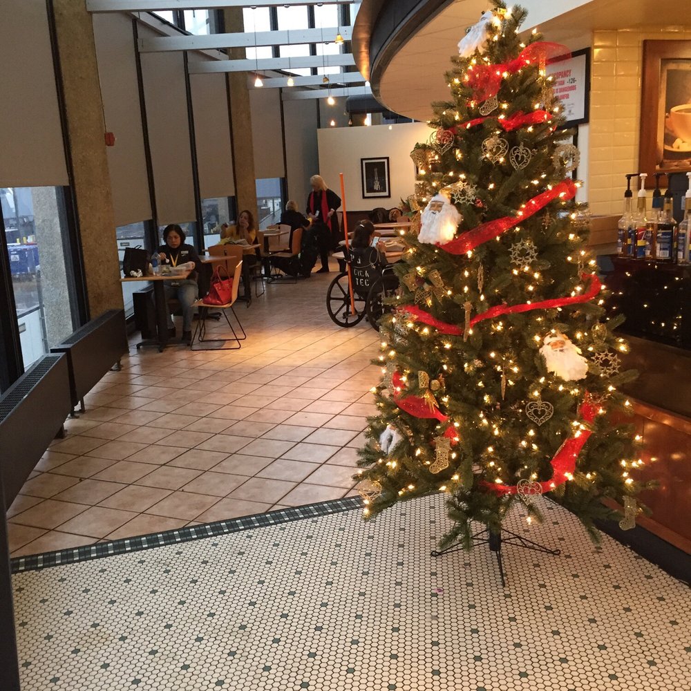Brioche Doree - Christmas tree in front of the entrance to the sitting area - Coffee & Tea Near Me - Chicago, Illinois Brioche Doree - Christmas tree in front of the entrance to the sitting area - Coffee & Tea Near Me - Chicago, Illinois