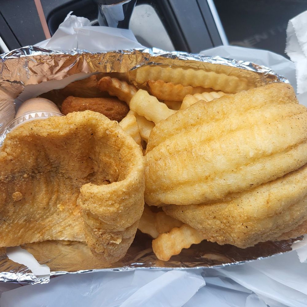 Fish Port 2 - 2 pc flounder w/fries & hush puppies (dock sauce included) - Seafood Near Me - Macon, Georgia Fish Port 2 - 2 pc flounder w/fries & hush puppies (dock sauce included) - Seafood Near Me - Macon, Georgia