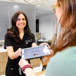 Revolution Medicine Health & Fitness - Patient check in for weight loss plans at our DC clinic.