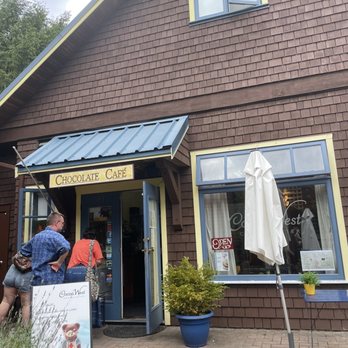 Cocoa West Chocolatier - two people outside a cafe - Chocolatiers & Shops Near Me - Bowen Island, British Columbia Cocoa West Chocolatier - two people outside a cafe - Chocolatiers & Shops Near Me - Bowen Island, British Columbia