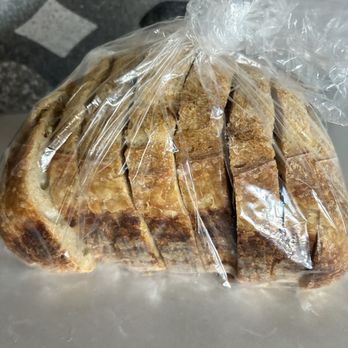 Atelier-T55 - Julian cut this loaf in thick slices for us. This sourdough is delicious and baked to perfection! Crunchy on outside. - Bakeries Near Me - Las Vegas, Nevada