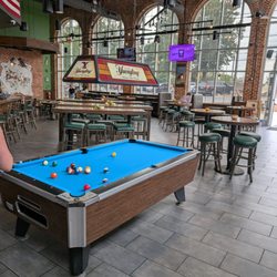 There is a pool table both indoor and outdoors. Pretty cool