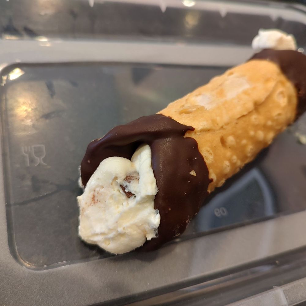 Cannoli (they put the filling in when you order it so the shell stays nice and crunchy) Cannoli (they put the filling in when you order it so the shell stays nice and crunchy)