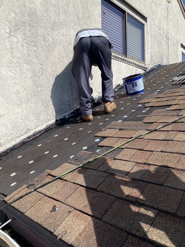Slide of V & A Roofing