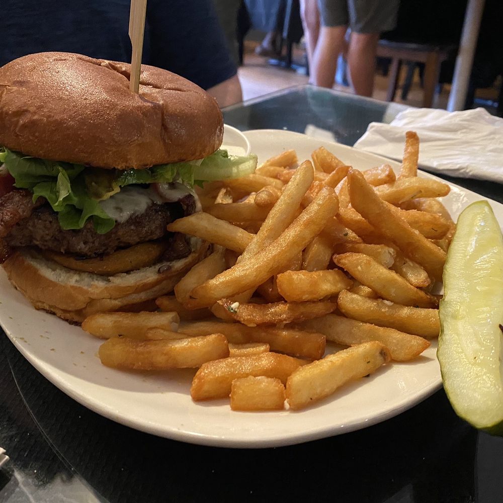 This is the Southwest burger with a side of garlic fries. This is the Southwest burger with a side of garlic fries.