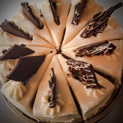 Sweet E Bakeshoppe - Triple-tier pumpkin cake + mascarpone buttercream + housemade dark chocolate cherry bark