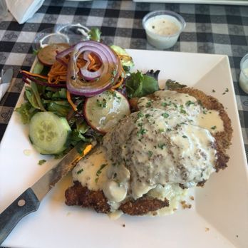 7 Mile House - Fried pork chops on top of mashed potatoes - Sports Bars Near Me - Brisbane, California