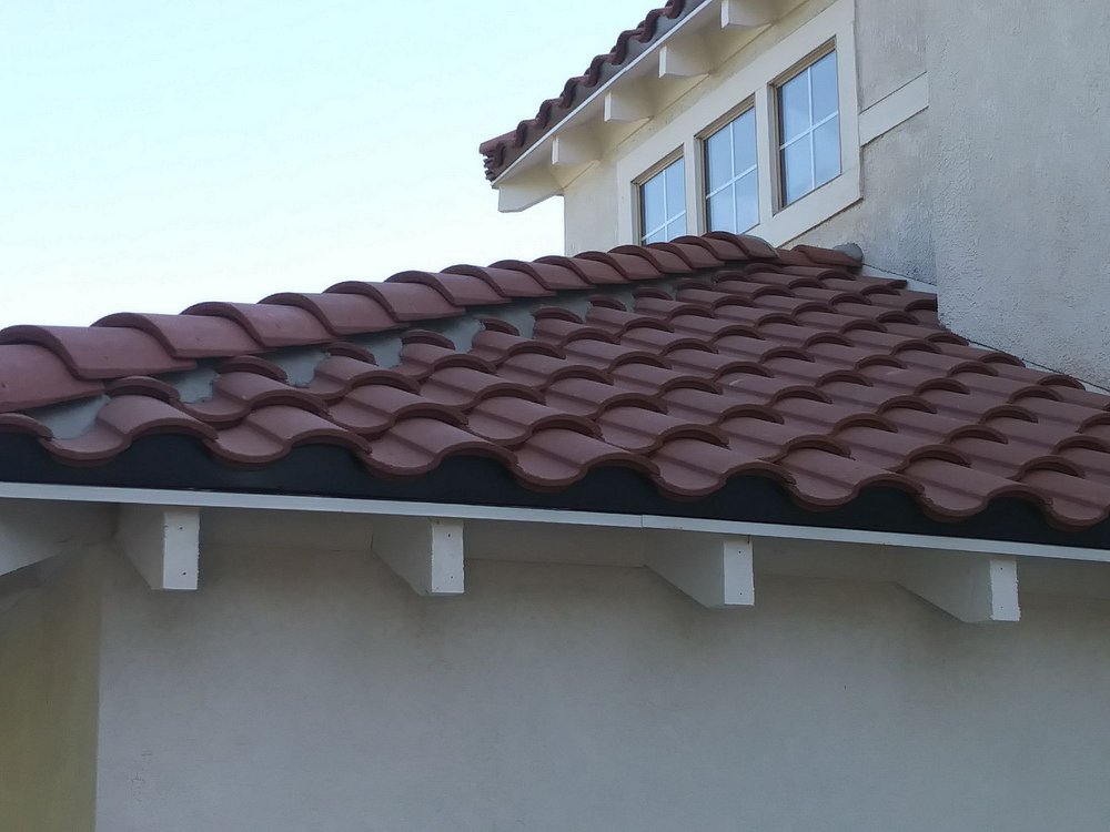 Slide of Freeman and Sons Roofing