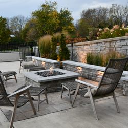 Inside Out Landscape Design - We did not install angled wall. Fire seating area right next to pool