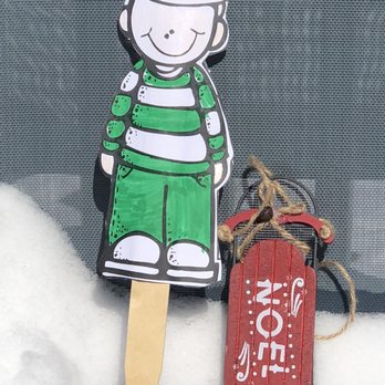 Walgreens - a wooden cutout of a boy and a sled - Drugstores Near Me - Oregon, Wisconsin