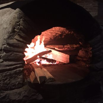 American Flatbread - The cauldron oven. - Pizza Near Me - Burlington, Vermont American Flatbread - The cauldron oven. - Pizza Near Me - Burlington, Vermont