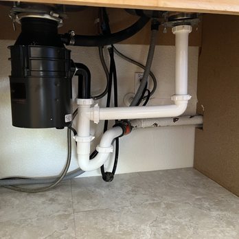 Rooter Solutions Plumbers San Jose - Under the kitchen sink. New ABS plastic piping and new 3/4 HP garbage disposal. - Plumbing Near Me - San Jose, California Rooter Solutions Plumbers San Jose - Under the kitchen sink. New ABS plastic piping and new 3/4 HP garbage disposal. - Plumbing Near Me - San Jose, California