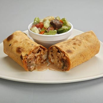 Muscle Maker Grill - a burrito cut in half with a bowl of salad - American Near Me - Turnersville, New Jersey Muscle Maker Grill - a burrito cut in half with a bowl of salad - American Near Me - Turnersville, New Jersey