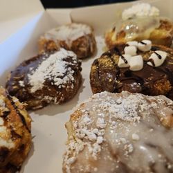 Parlor Doughnuts - Lemon ,  honey glazed,  regular classic glazed, s'more,  churro and turtle cheesecake