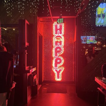 Happy Camper - Photo wall to the back - Pizza Near Me - Denver, Colorado