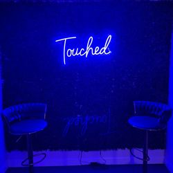 Touched Massage Studio - Touched photo wall