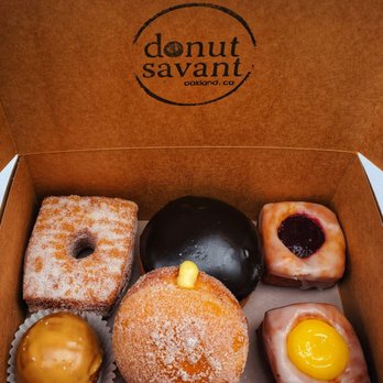 donut savant - Top R clockwise: omj, lemon, Jane dough, salted maple, sugar dusted constantly, chocolate frosted. - Donuts Near Me - Oakland, California donut savant - Top R clockwise: omj, lemon, Jane dough, salted maple, sugar dusted constantly, chocolate frosted. - Donuts Near Me - Oakland, California