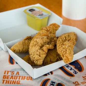Harvey's - a tray of fried chicken and a cup of coffee - Burgers Near Me - Mississauga, Ontario Harvey's - a tray of fried chicken and a cup of coffee - Burgers Near Me - Mississauga, Ontario