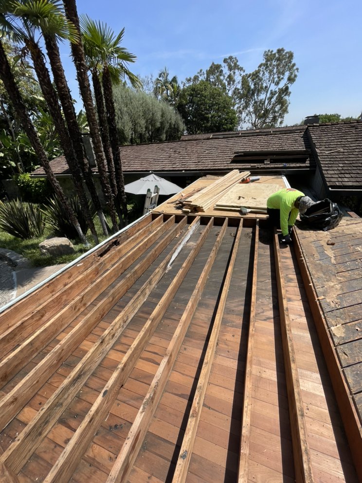 Slide of New Village Roofing