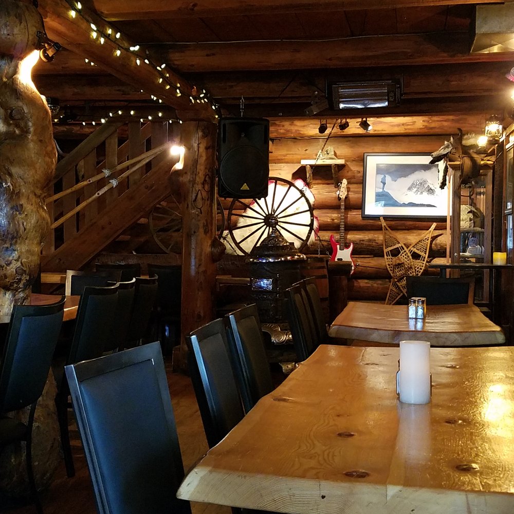 The Wolf's Den - Great atmosphere, love the tree table tops. - Burgers Near Me - Golden, British Columbia The Wolf's Den - Great atmosphere, love the tree table tops. - Burgers Near Me - Golden, British Columbia