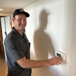 The owner Nate Abell demonstrating the thermostat operation. The owner Nate Abell demonstrating the thermostat operation.