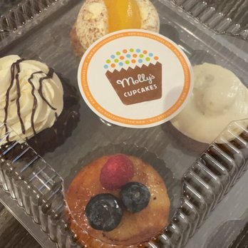 Molly's Cupcakes - 4-pack takeout - Carrot Cake topped with Cream Cheese Frosting - Crème Brûlée - Flourless Chocolate - Peach Cobbler - Desserts Near Me - Chicago, Illinois Molly's Cupcakes - 4-pack takeout - Carrot Cake topped with Cream Cheese Frosting - Crème Brûlée - Flourless Chocolate - Peach Cobbler - Desserts Near Me - Chicago, Illinois