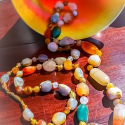 Aurora's Beads & Jewelry Design - Re-strung to perfection. Quality, patience, and artisianship are attributes you will find at Aurora's!