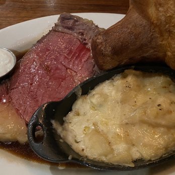 Prime Cut Cafe - Chefs cut prime rib with Potato Gratin - Steakhouses Near Me - Orange, California