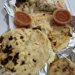 La Bendicion Pupuseria and Restaurant - Pupusas served with curtido & salsa roja