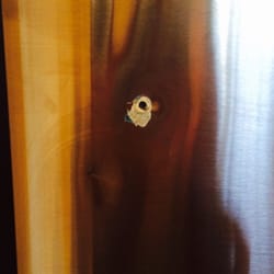 Hole in fridge door where handle was on the wrong side of the door.